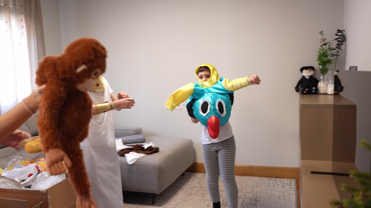 Children and Woman Dressing Up in Costumes at Home