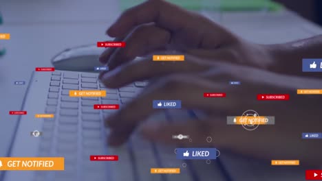 Animation-of-multiple-social-media-icons-against-mid-section-of-a-person-typing-on-keyboard