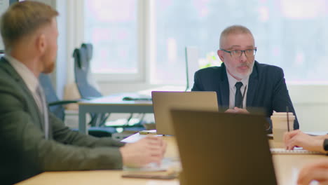 senior manager holding business meeting