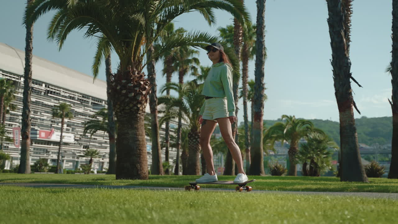 Woman Skateboarding in a Park