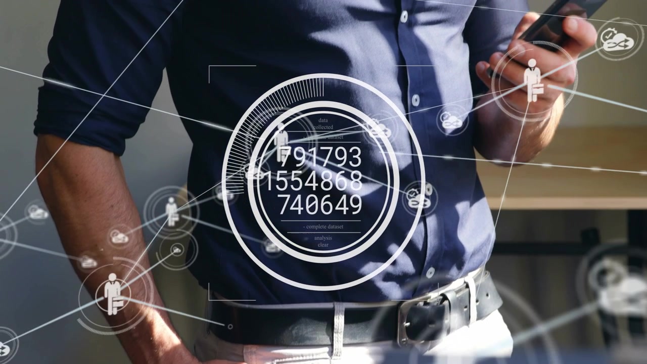 Office worker lifting smartphone and engaging HUD, expanding network nodes for technology demo