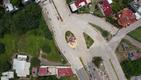 Aerial-footage-of-a-roundabout-in-Huajuapan-de-Leon,-Oaxaca,-Mexico