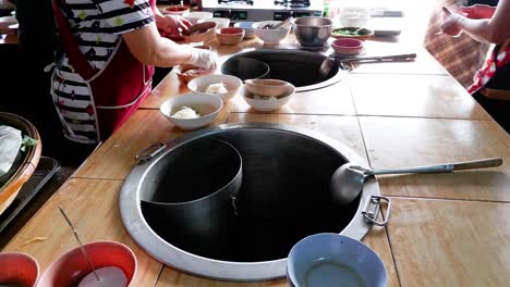 preparing noodles with teamwork and precision