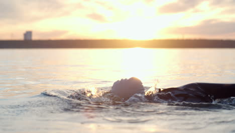 Woman-Dressed-In-Wetsuit-And-Swimming-Cap-3