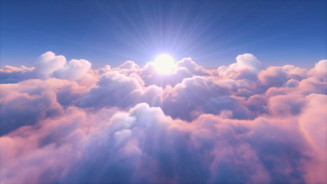 Vista aerea del sole che splende sopra nuvole soffici