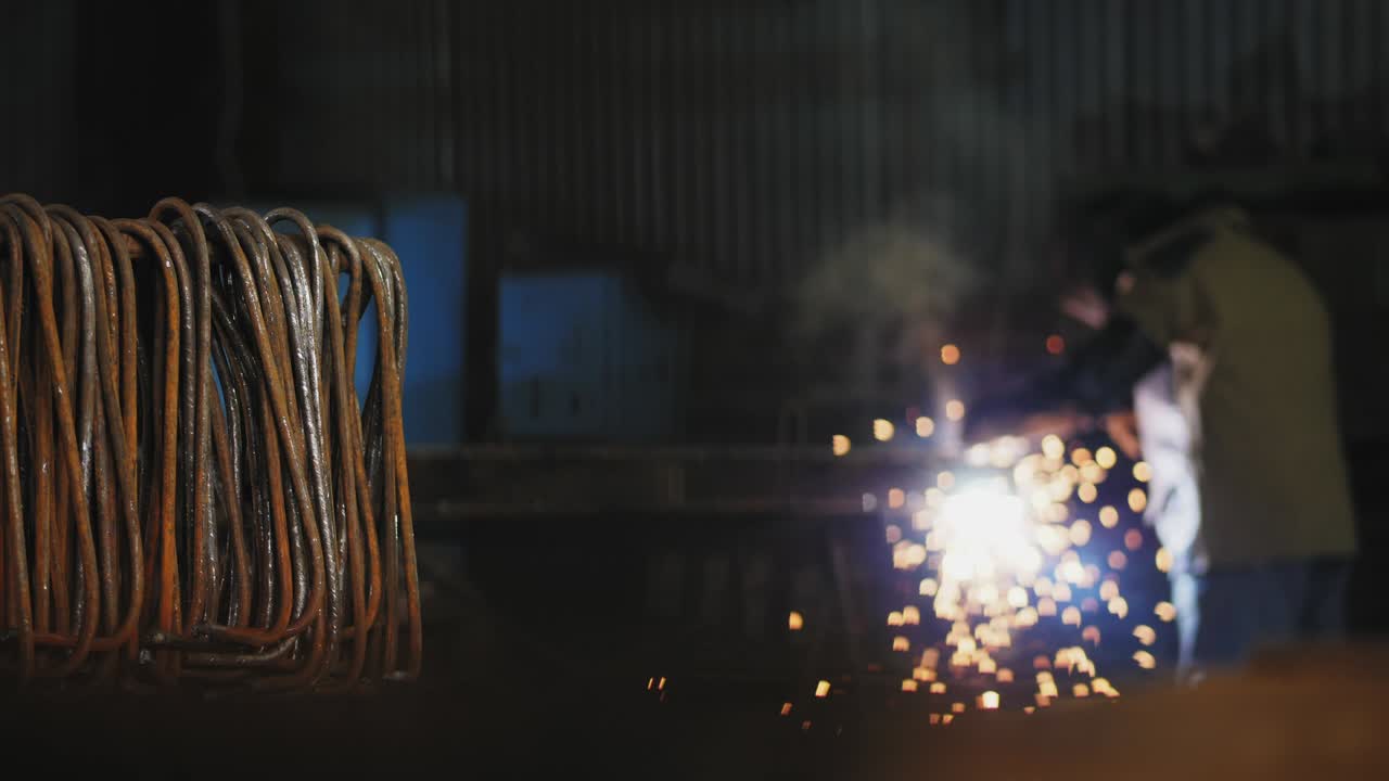 Steel parts in the background is out of focus welding