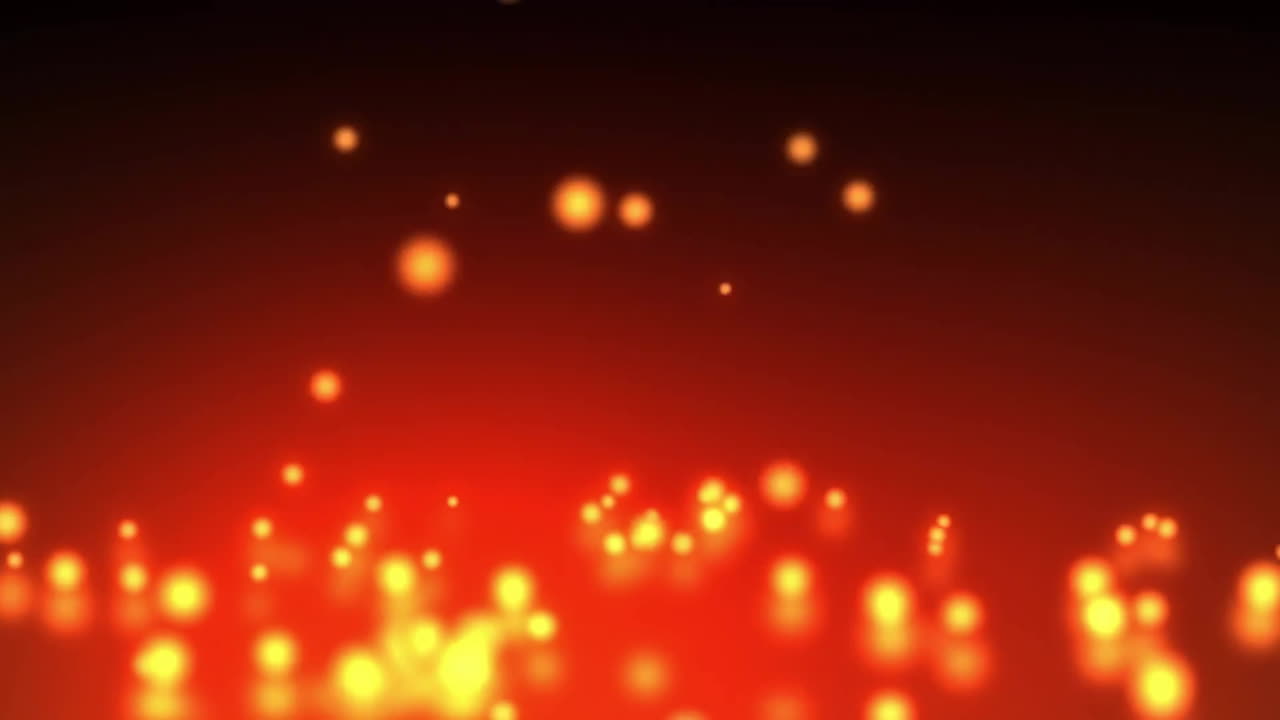 赤と黒の背景に黄色い点が降るアニメーション