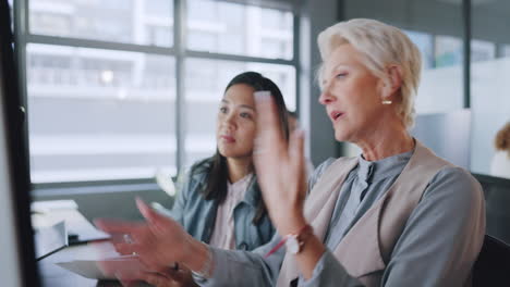 Business,-women-and-conversation-in-office