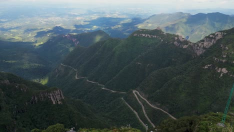 Reverse-Dolly-aerial-view-of-Mirante-da-Serra-do-Rio-Rastro-in-a-sunny-weekend-day---Lauro-Muller,-SC---Brazil