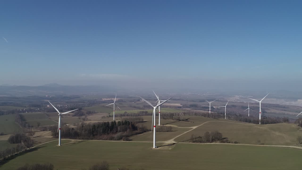 Wind turbines in the field - shot of green electricity in Czech Republic