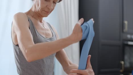 senior woman doing resistance band exercises