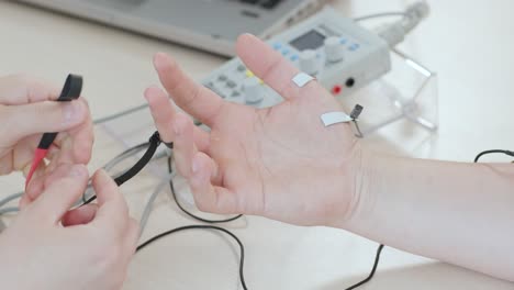 patient nerves testing using electromyography at medical center