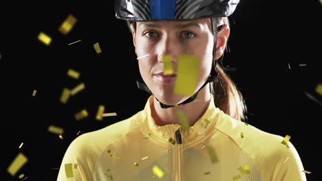 animation of confetti falling over caucasian female cyclist on black background