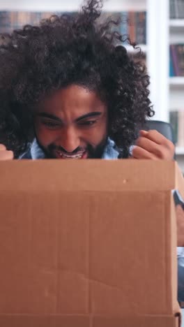 unboxing a mystery package at home while sitting in a cozy reading nook