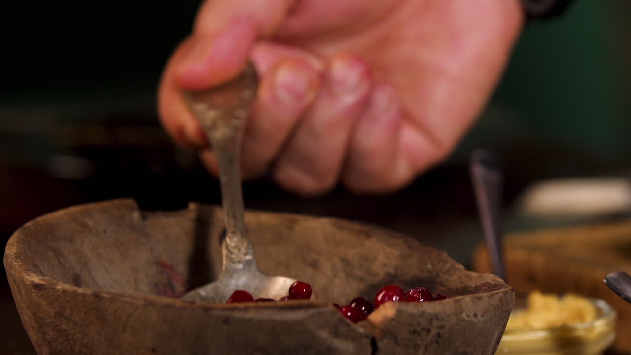 Preparing Cranberry Dish with Vintage Spoon