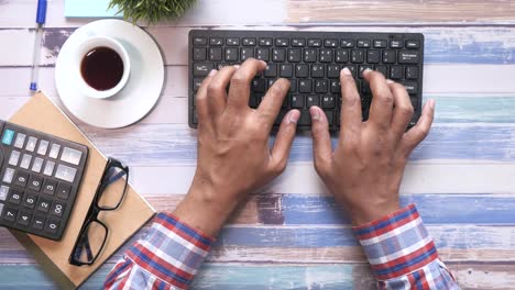 person working on a computer at a desk