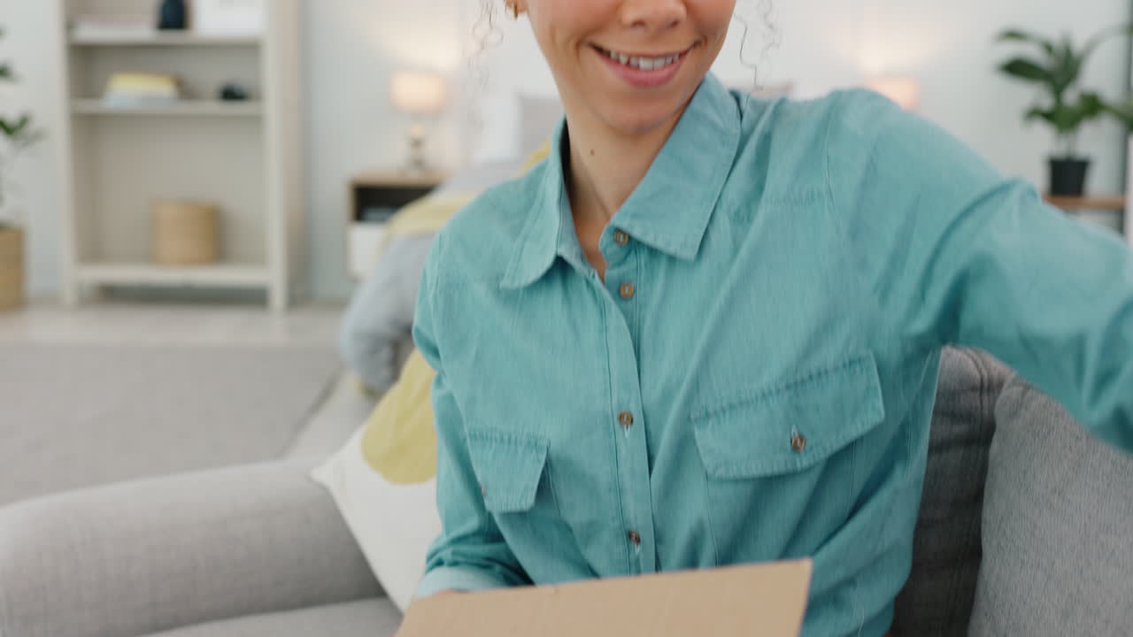 Woman, delivery box and open package
