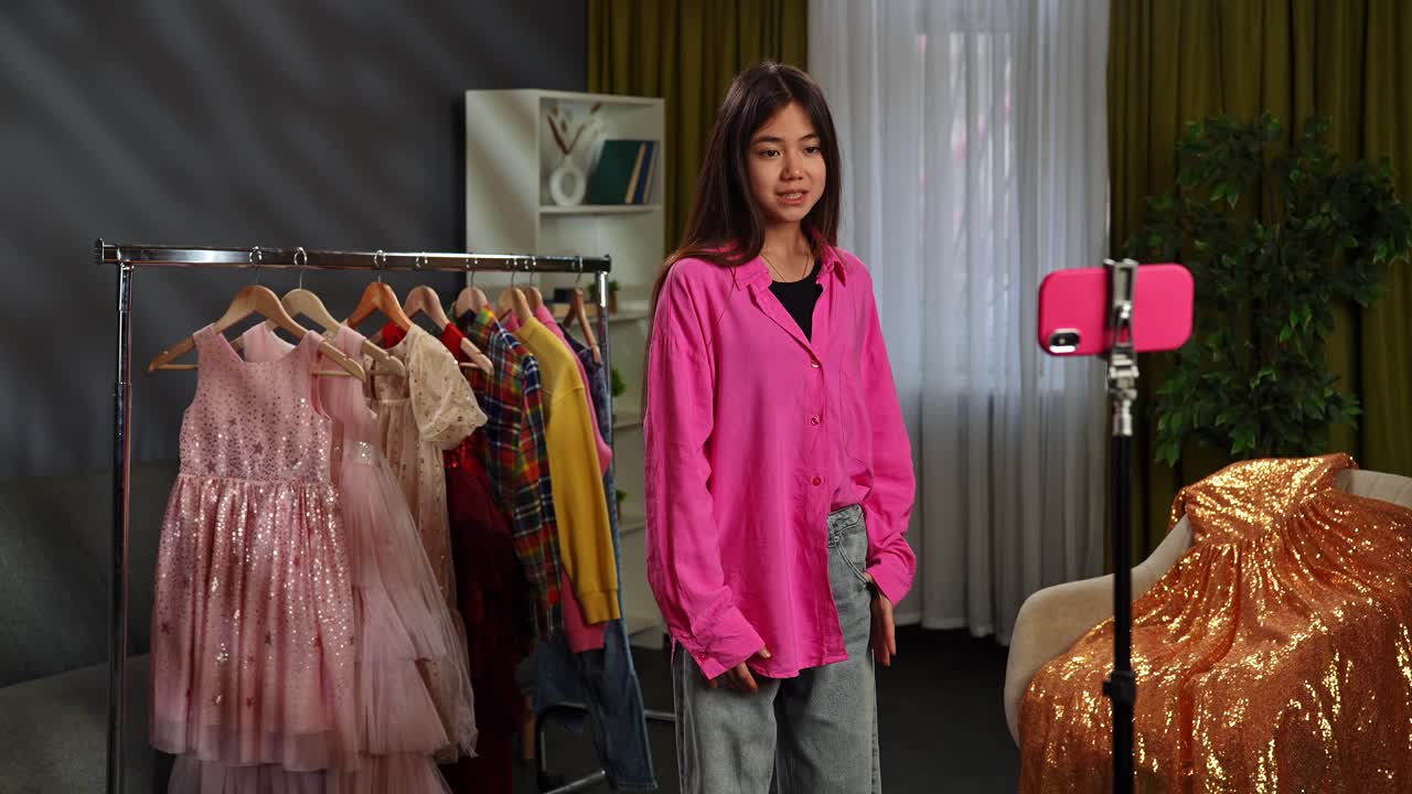 Teenager vlogger showcasing clothes