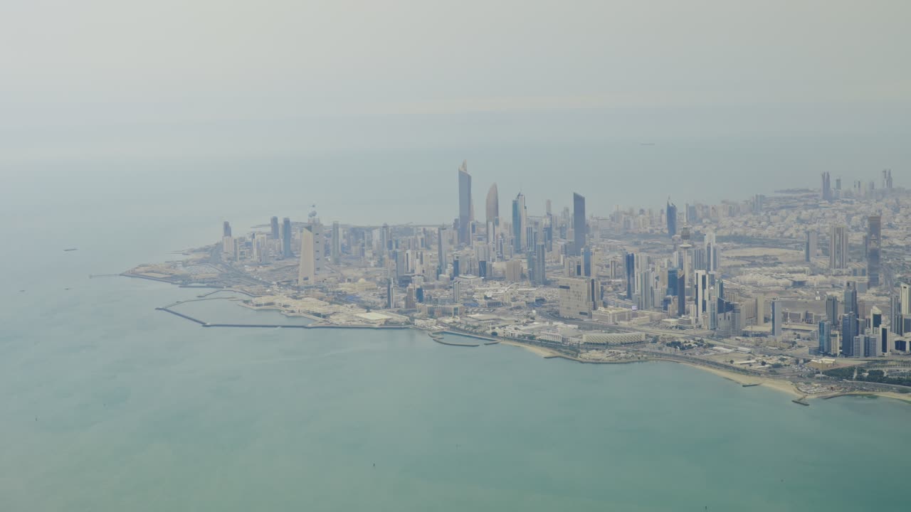 Kuwait City, as viewed from aircraft, hazy daytime view of downtown district