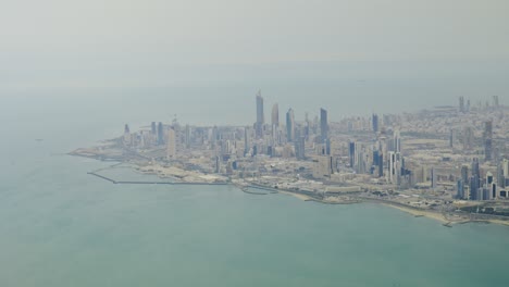 kuwait city, as viewed from aircraft, hazy daytime view of downtown district