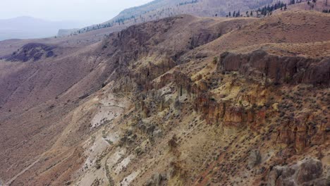 Drone-flies-over-unique-rock-formations-near-Chache-Creek