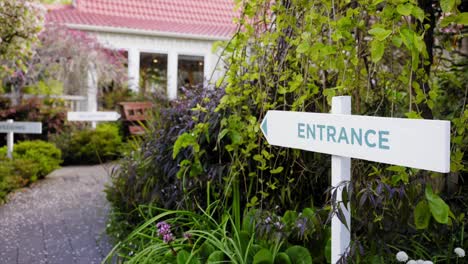 entrance sign and the way to the hall