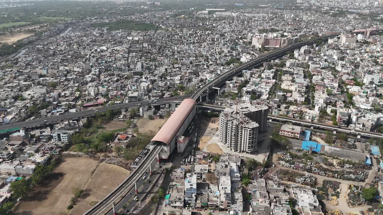 Scenic aerial capture of Jaipur's urban pulse with metro station in the middle of the city