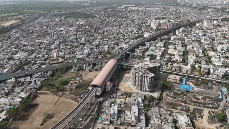 scenic aerial capture of jaipur's urban pulse with metro station in the middle of the city