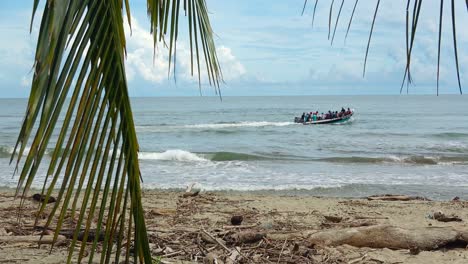 Motorboat-packed-with-Immigrant-Passengers-navigating-away-from-the-shore