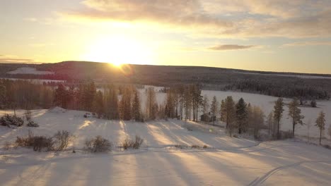 Small-rural-town-of-Borgvattnet-in-Sweden,-next-to-a-frozen-lake