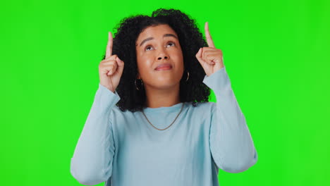 Woman,-pointing-up-or-green-screen-for-advertising