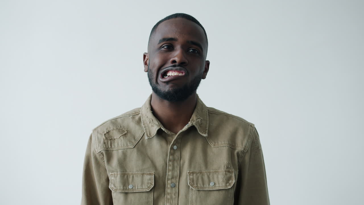 Man in a brown shirt