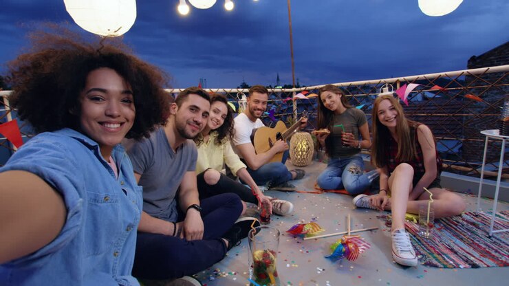 Friends Enjoying Rooftop Party Selfie