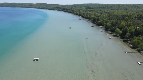 shoreline of big glen lake, near glen arbor michigan, popular for recreational boating