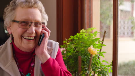 senior woman, phone call and laughing