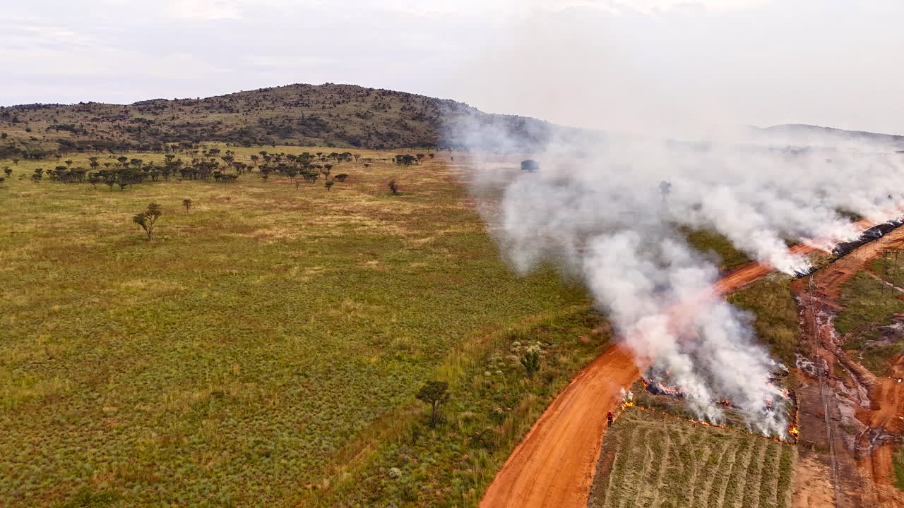 Drone timelapse of fire breaks being burnt in preparation for fire season risk