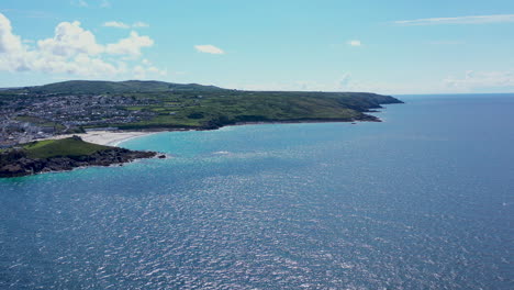 Aerial-drone-view-along-Porthmeor-beach-in-st-ives-Cornwall