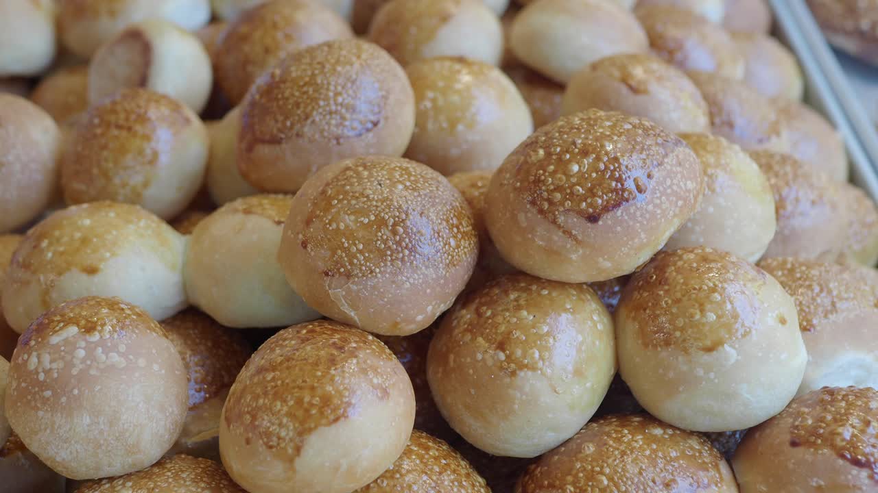 Pile of fresh baked bread buns
