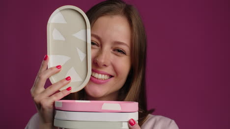 woman presenting decorative trays
