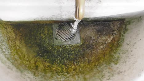 dirty outdoor fountain