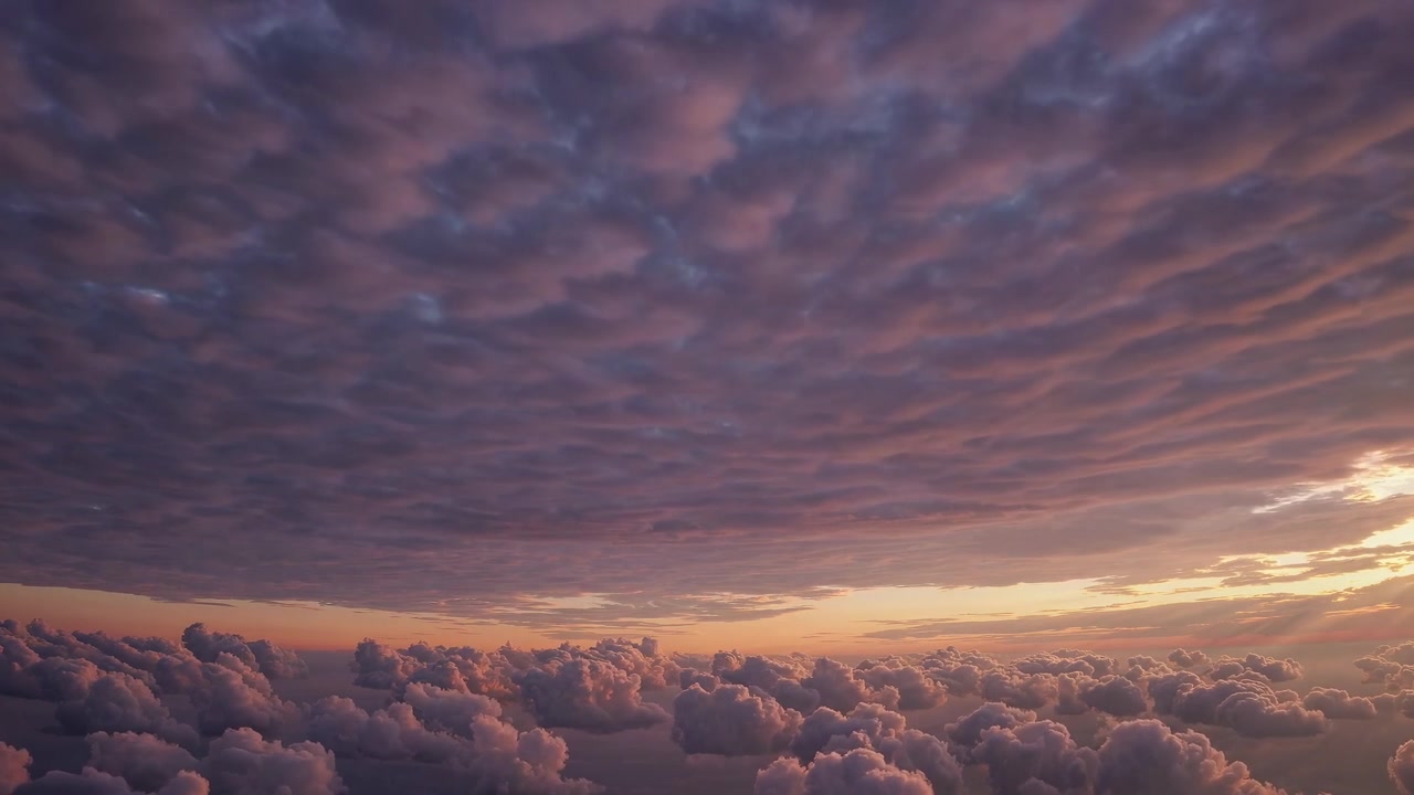 Stunning Aerial View of Colorful Clouds During Sunset