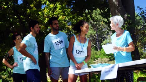 athletes registering themselves for marathon 4k