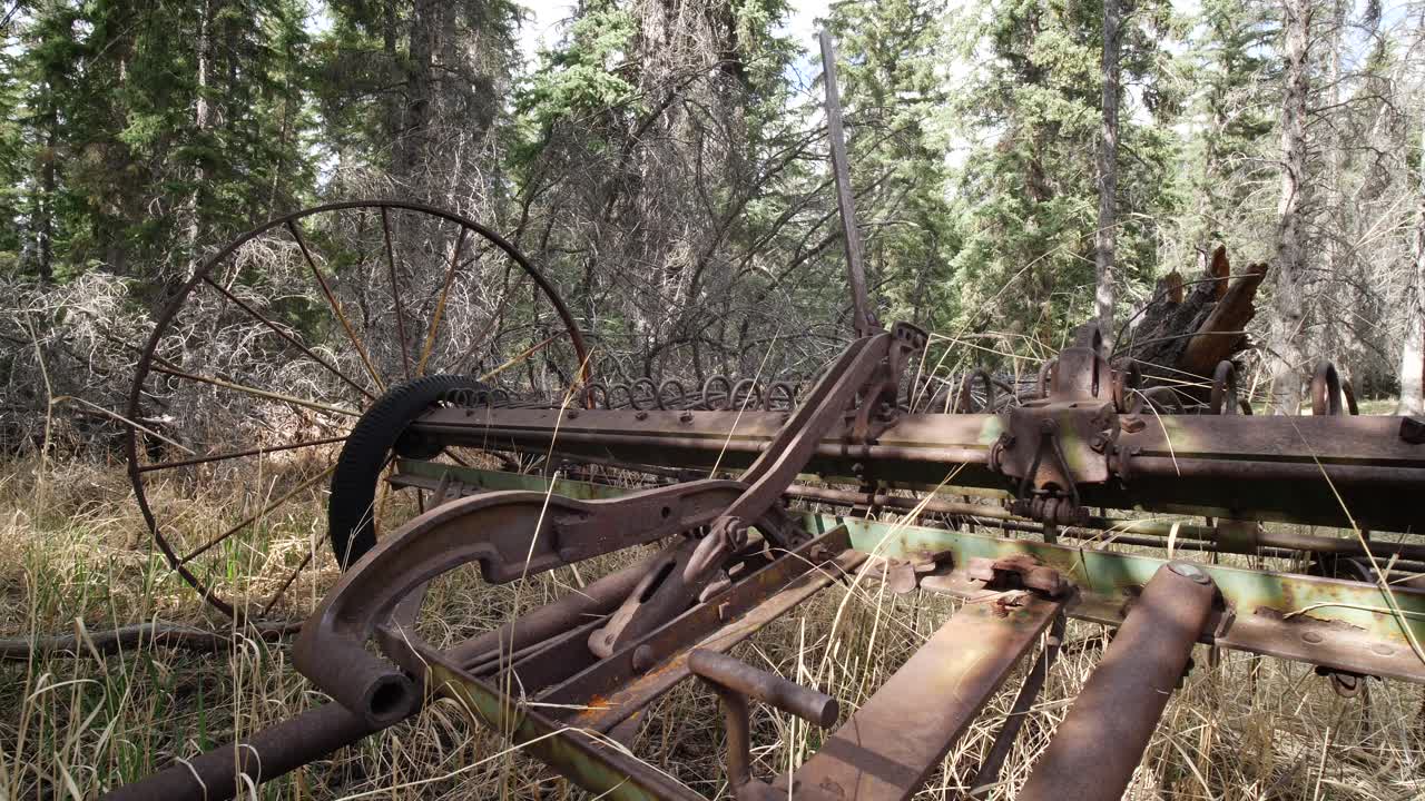 Antique hay rake. Panning shot