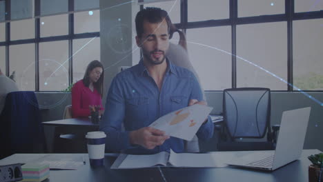 man in office holding document with network connections animation overlay