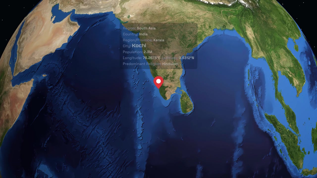 Rotating globe zooms into Kochi India with a location pin and demographic information overlay