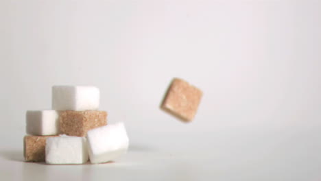 sugar cubes falling down in super slow motion