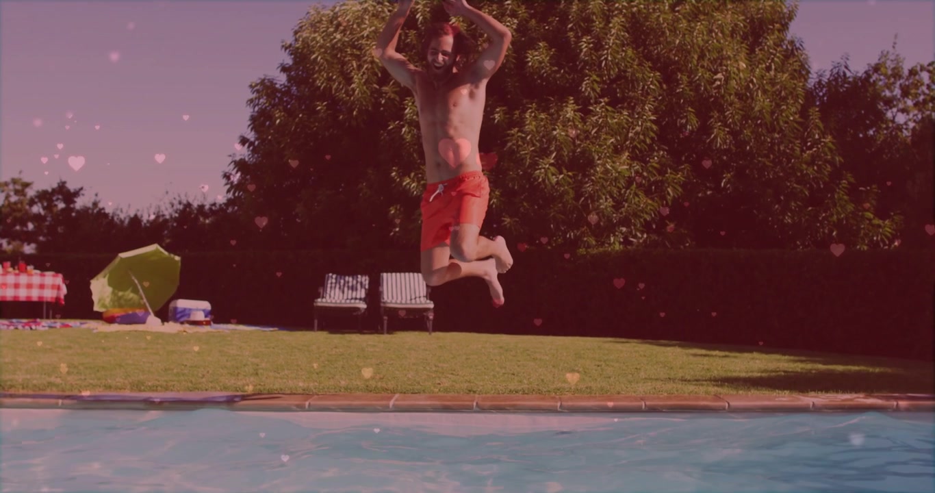 Uomo in costume rosso che corre e si tuffa in piscina, creando uno schizzo con un'icona a cuore rosa in sovrimpressione per la salute.