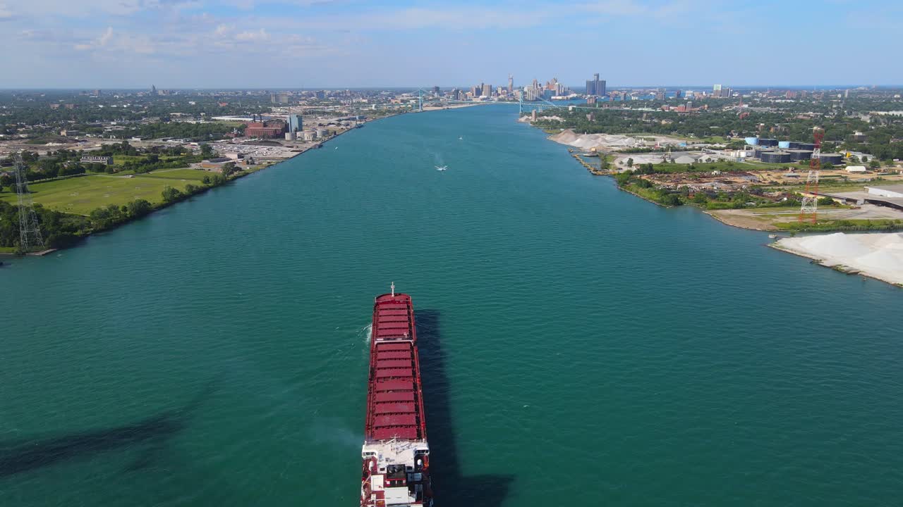 Aerial View of Gordie Howe Bridge Construction with Vessel Passing Beneath in Detroit River