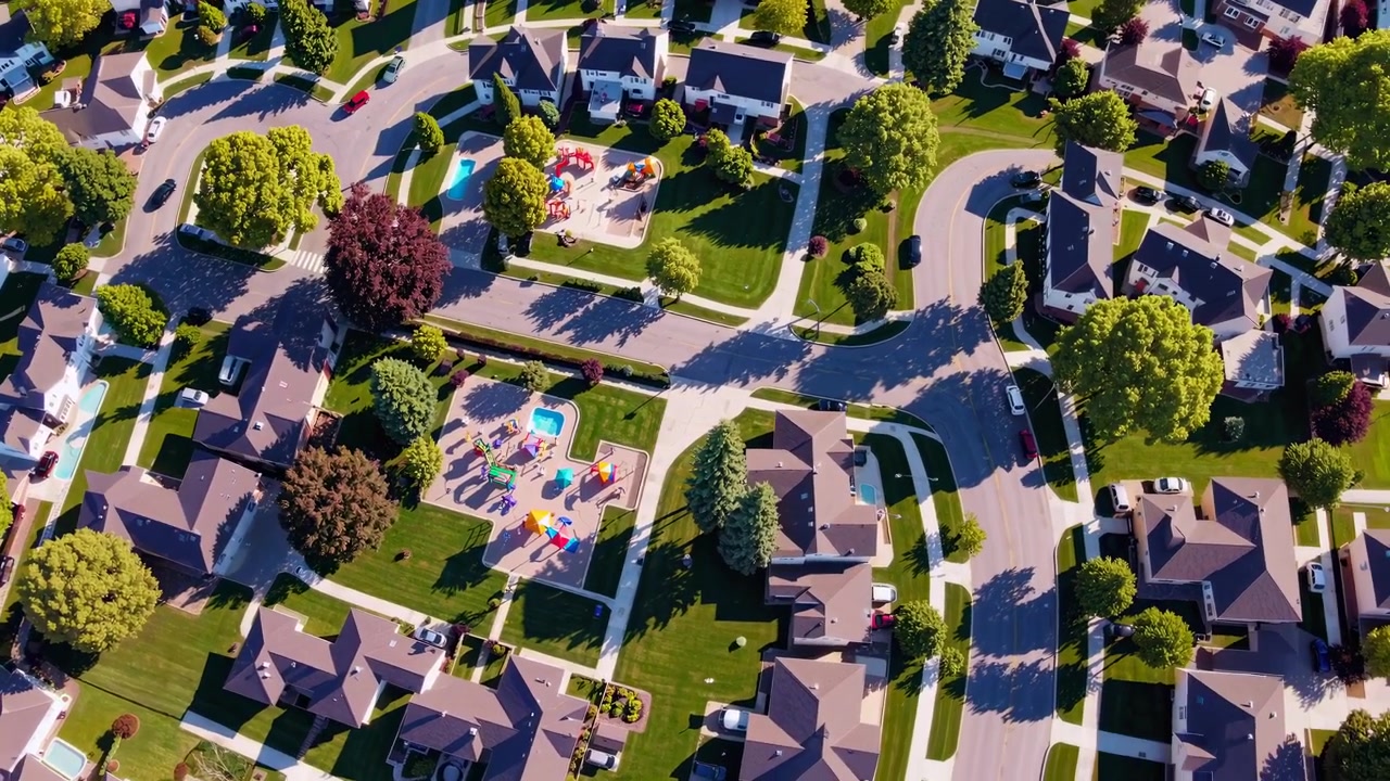 Aerial View of Suburban Neighborhood with Playground and Houses