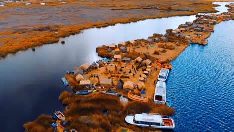 Highest-lake,-Lake-Titicaca,-Flying-over-Titicaca,-DJI-4k-video-of-floating-islands-on-lake,-Floating-islands-of-Peru,-Floating-islands-of-Puno,-Floating-islands-of-grass,-Lake-Titicaca,-Puno-Lake